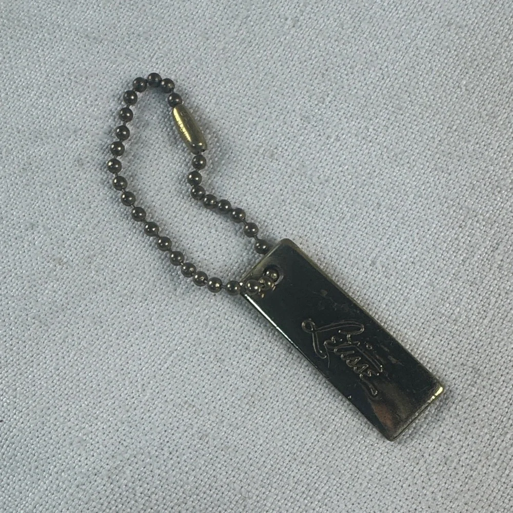 Letisse double sided gold bag charm tag